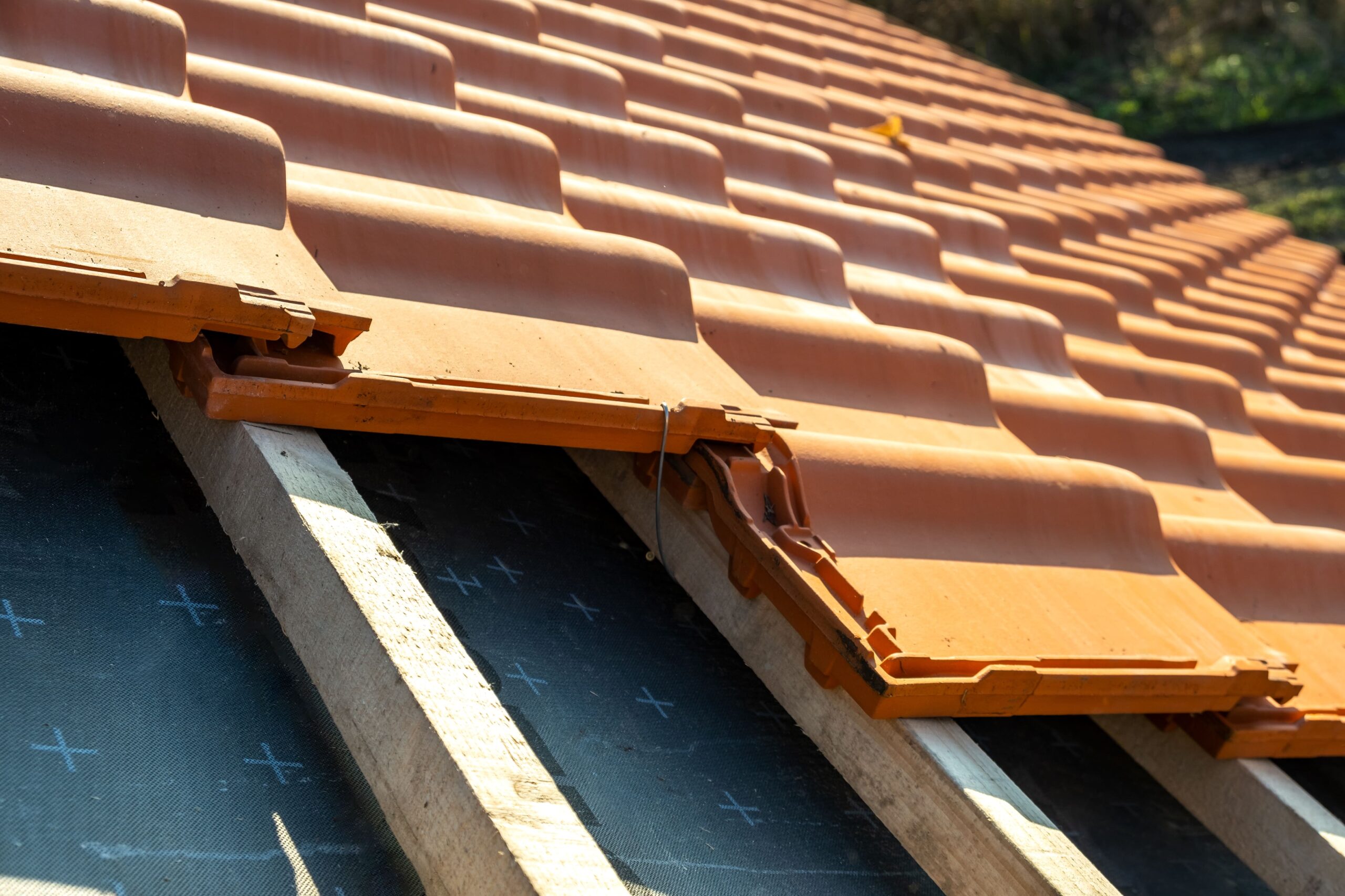 terracotta-roof-tiles-on-wooden-support-structure-2026-03-17-14-44-48-utc